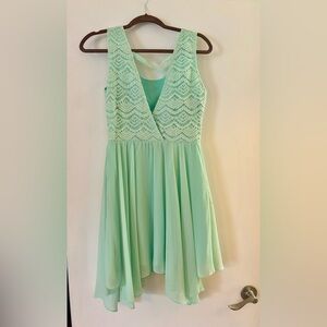 Size large mint green dress, beautiful lace detail on the bodice!